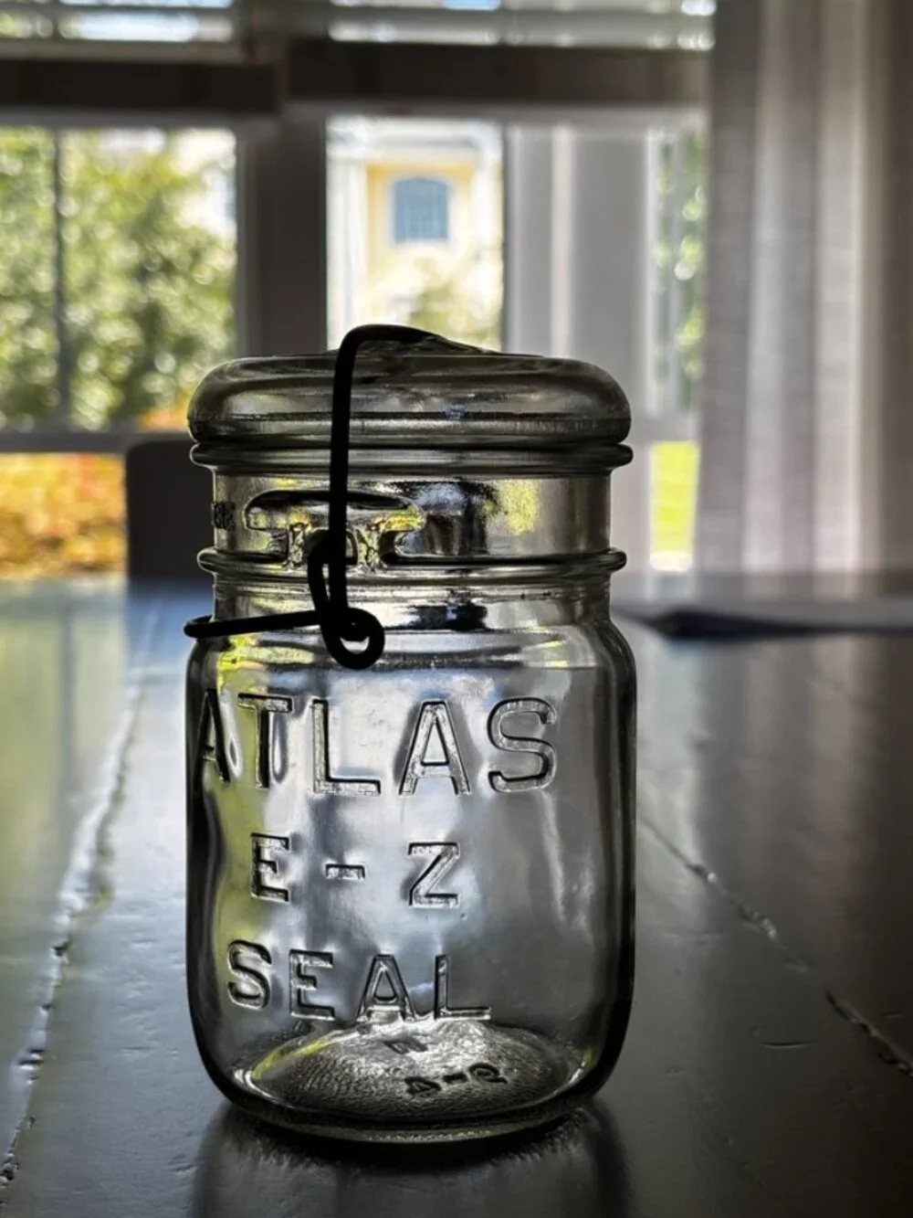 Hazel-Atlas “Atlas E-Z Seal” clear glass canning jar, likely 1930s–1940s.